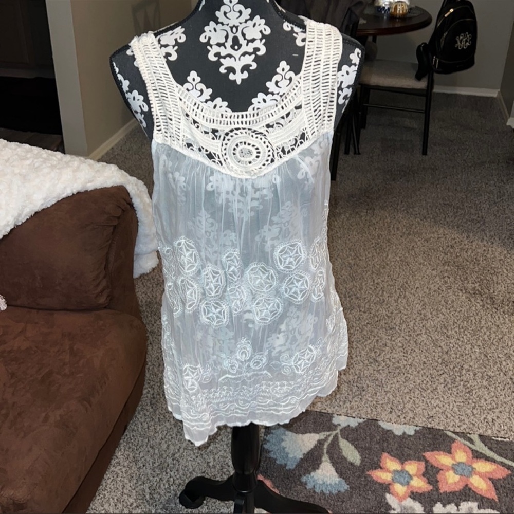 Sheer sleeveless top